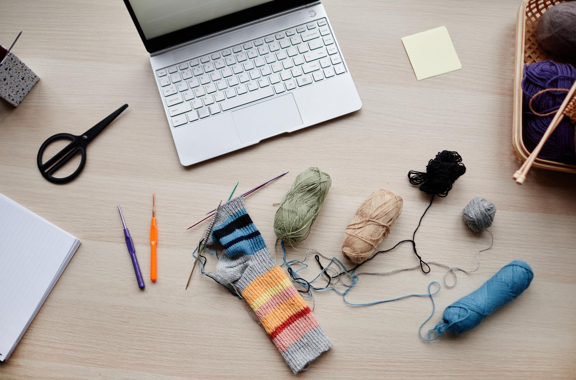 Studio workspace with threads and hoop